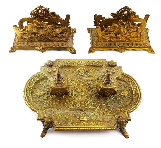 Appraisal: Rococo style desk accessories three pieces featuring Bradley Hubbard pair