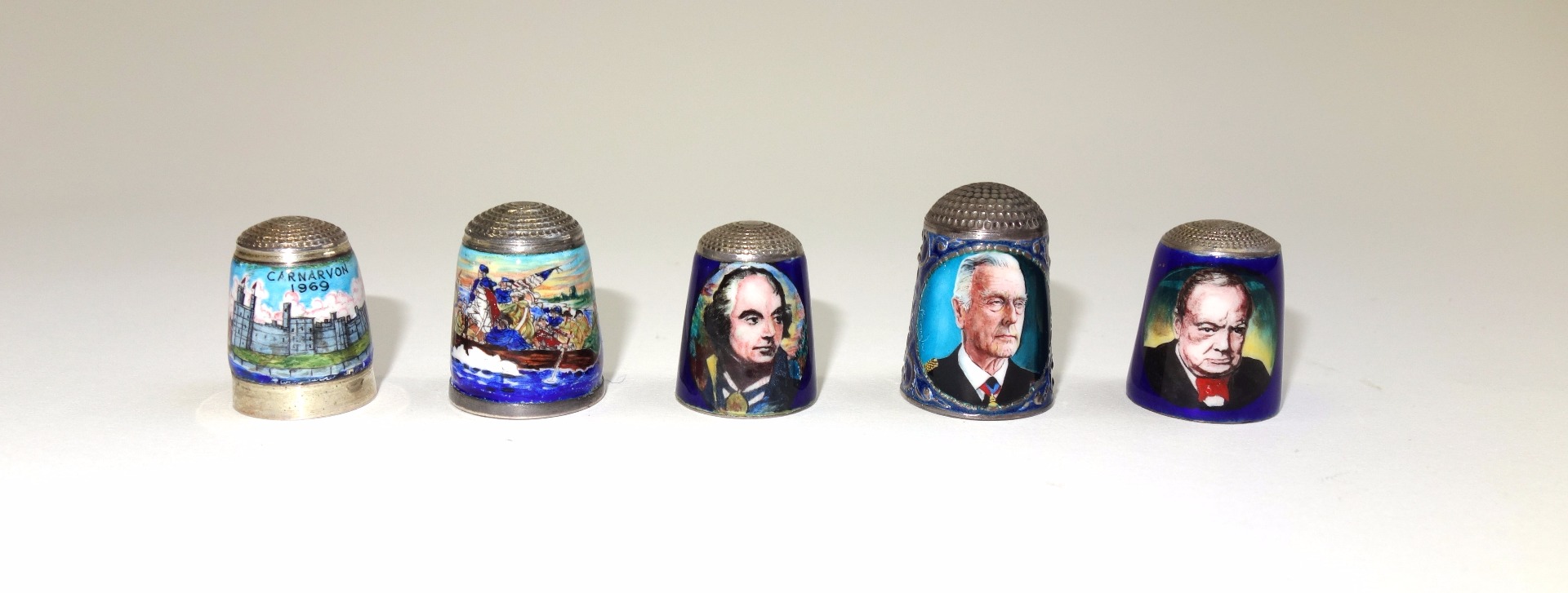 Appraisal: An English silver and enamel thimble by Peter Swingler depicting