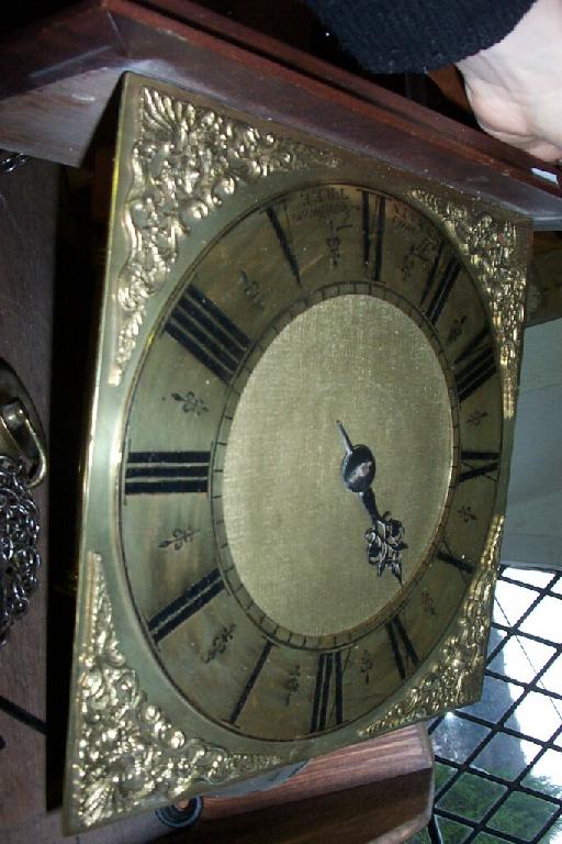 Appraisal: An th century hour wall clock with brass dial single