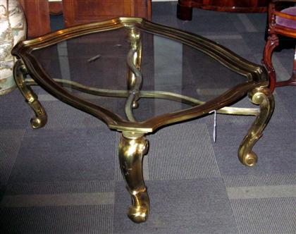 Appraisal: Baroque style brass and glass low table The heavy beveled