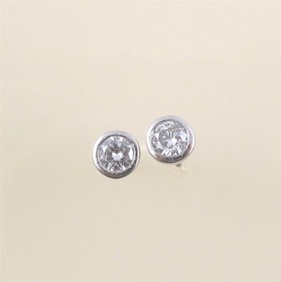 Appraisal: A pair of diamond stud earrings set with brilliant cut