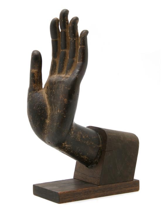 Appraisal: Southeast Asian Painted Terracotta Model of the Hand of Buddha