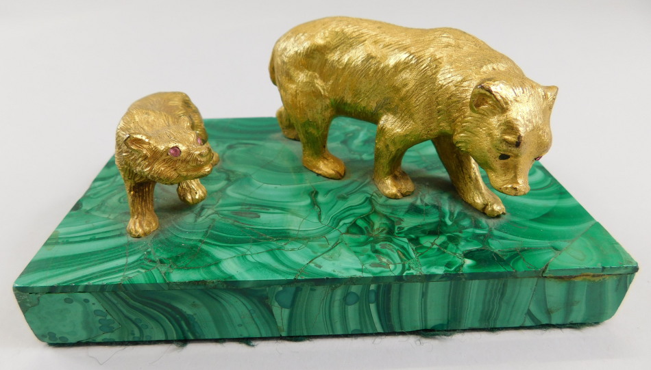 Appraisal: A thC desk ornament or paperweight cast with two gilt