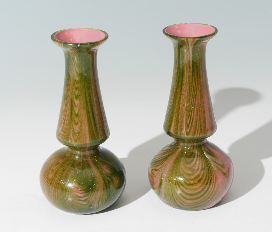 Appraisal: PAIR BOHEMIAN RINDSKOPF BUD VASES Pink and green swirl glass