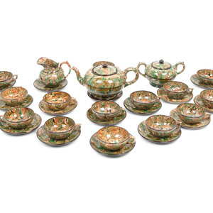 Appraisal: A French Aptware Marbelized Faience Tea Service TH CENTURY comprising