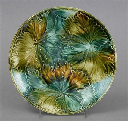 Appraisal: MAJOLICA GRAPE LEAF MOLDED PLATE Unmarked in shades of green