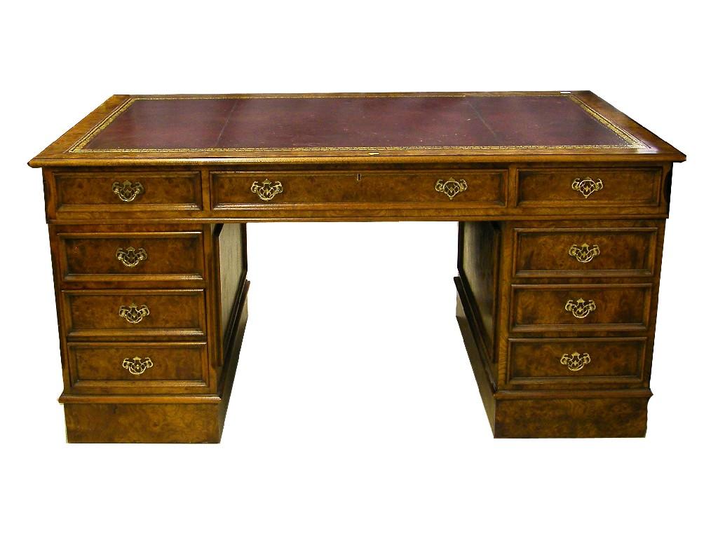 Appraisal: Good quality burr wood partners style pedestal desk the burgundy