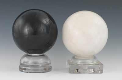 Appraisal: Black White Onyx Spheres Both spheres of polished onyx displayed