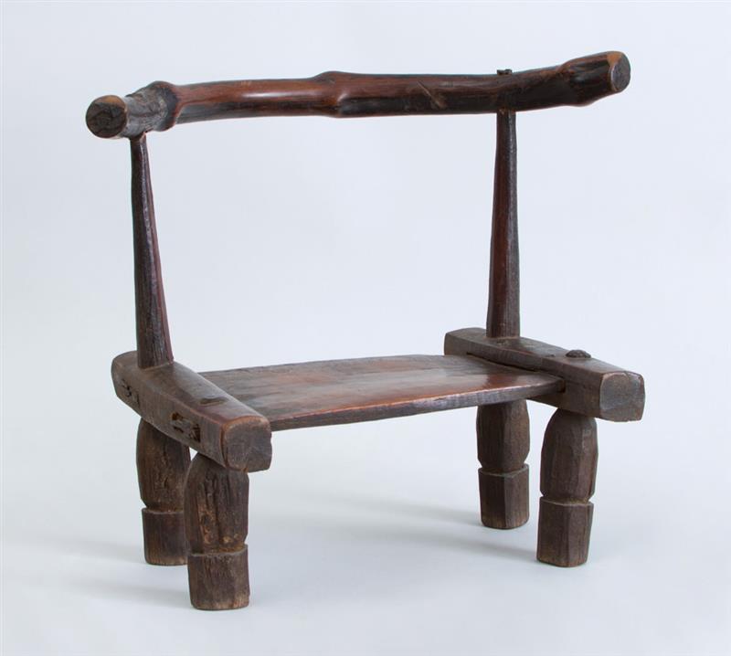 Appraisal: AFRICAN CARVED HARDWOOD CHILD'S CHAIR x x in Property from