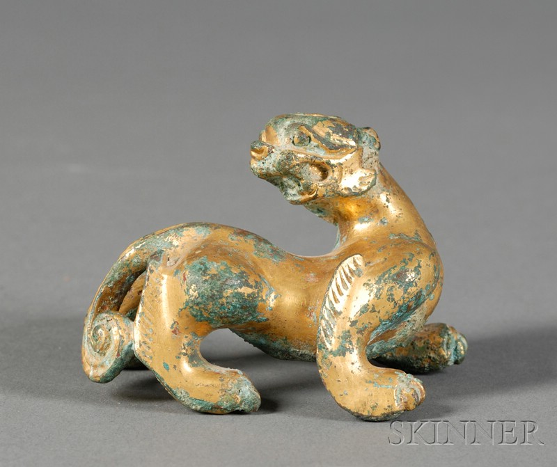 Appraisal: Gilt-bronze Sleeve Weight China Han period nd century B C