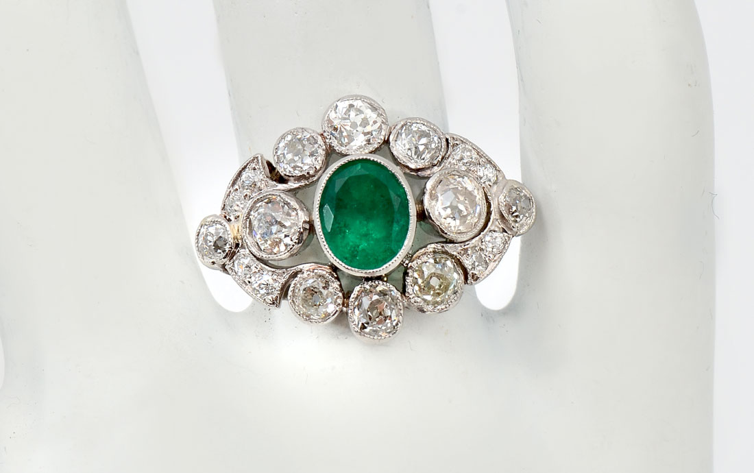 Appraisal: PLATINUM EDWARDIAN EMERALD DIAMOND RING CT oval mixed cut emerald