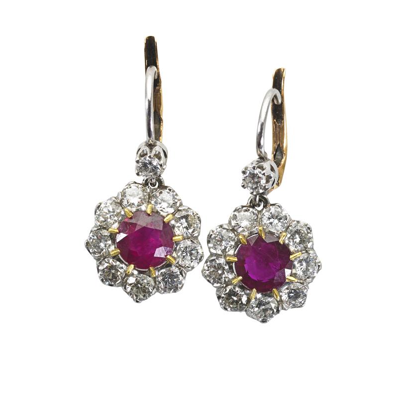 Appraisal: FINE BURMA RUBY AND DIAMOND EARRINGS Circular cut faceted rubies