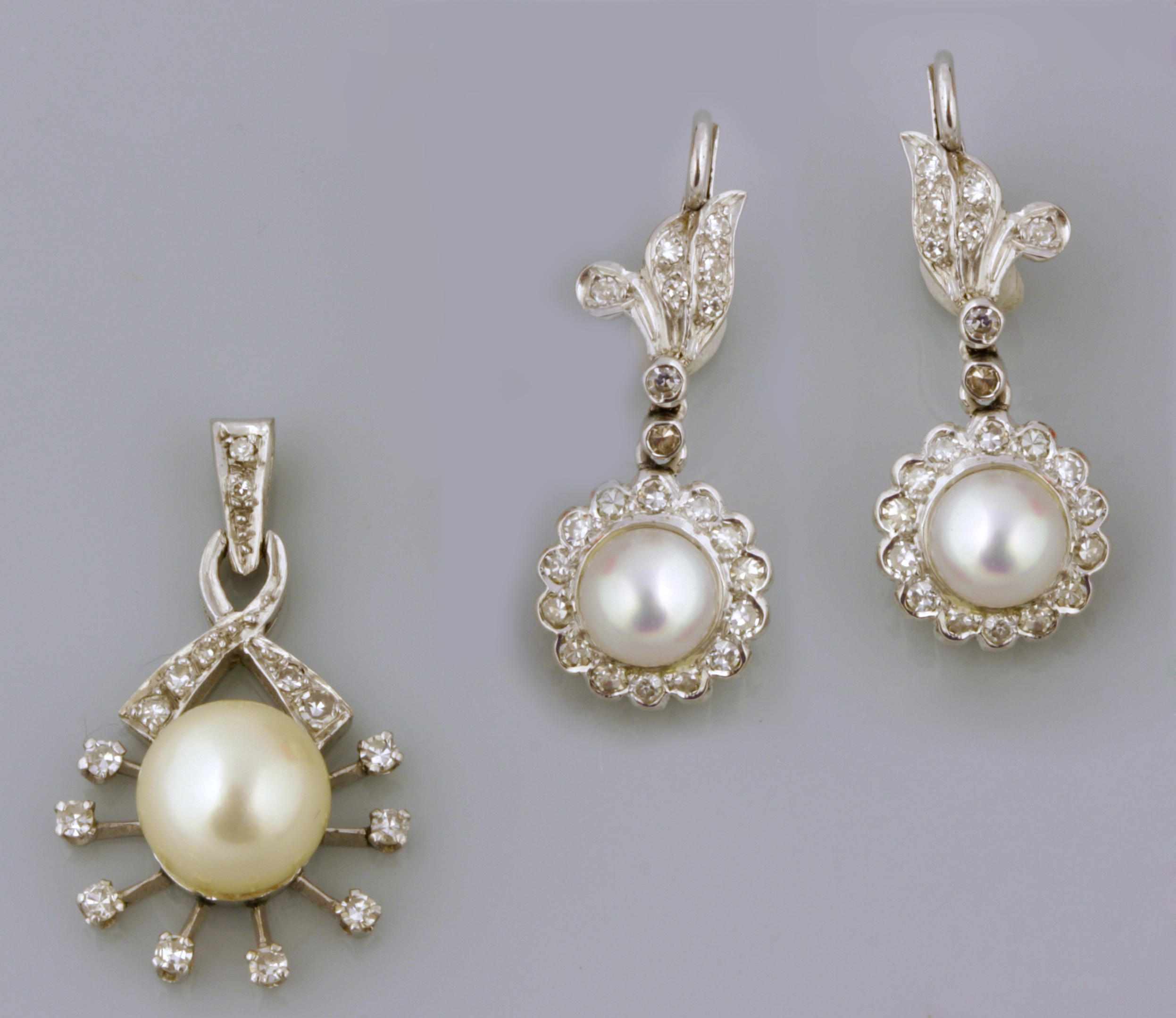 Appraisal: A pair of cultured pearl diamond and white gold pendant