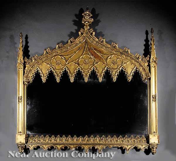 Appraisal: A Gothic Revival Highly Carved and Gilded Overmantel Mirror early