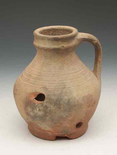 Appraisal: AN ENGLISH MEDIEVAL JUG in coarse-ware probably from Oxford th