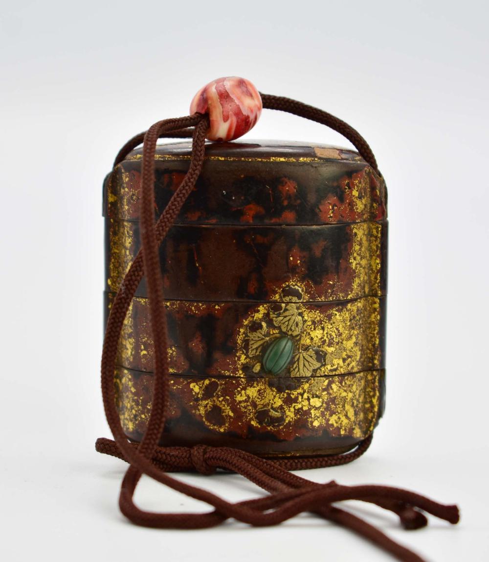 Appraisal: JAPANESE LACQUER INRO th th Century The three-compartment case decorated