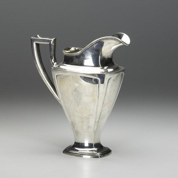 Appraisal: AMERICAN SILVER Water pitcher by Wallace in the Adams style