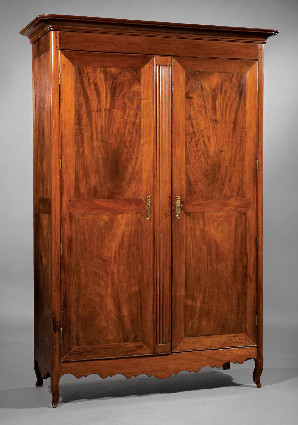 Appraisal: Louisiana Carved Cherrywood Armoire early th c later ogee cornice