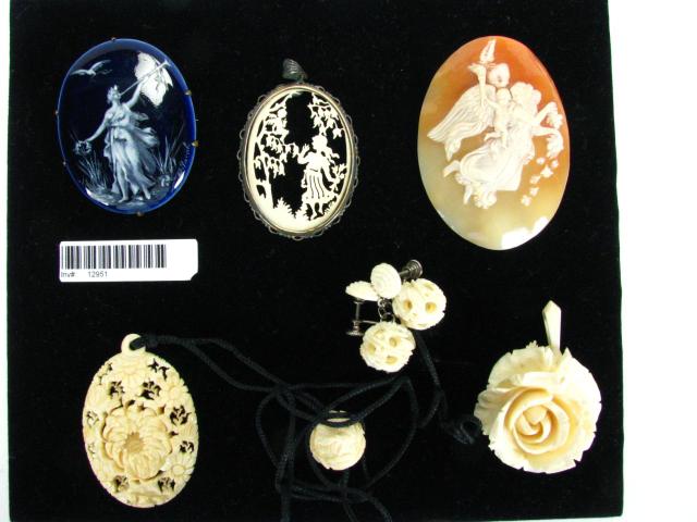 Appraisal: Collection of Carved Vintage Jewelry including an oval cameo depicting