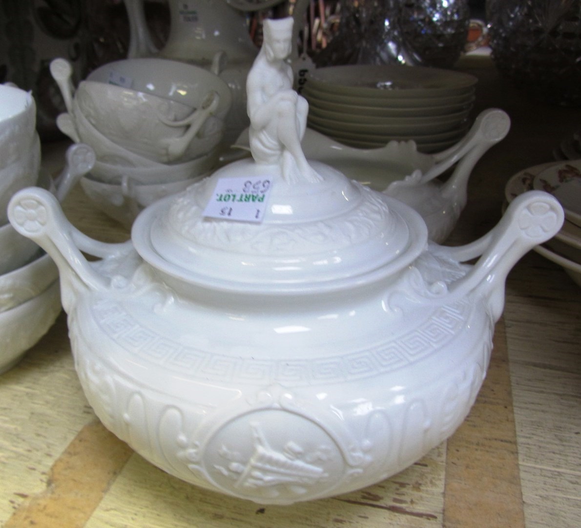 Appraisal: A Limoges white glazed porcelain part tea service th century