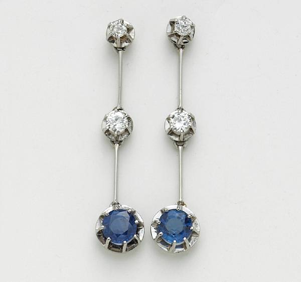 Appraisal: A pair of sapphire and diamond earrings mounted in fourteen