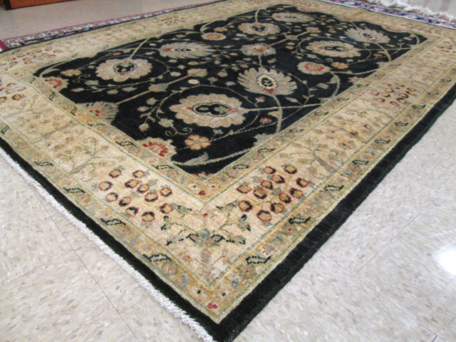 Appraisal: HAND KNOTTED ORIENTAL AREA RUG Pakistani-Persian palmette and scrolling vine