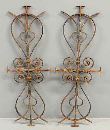 Appraisal: Two wrought iron decorative window grates x