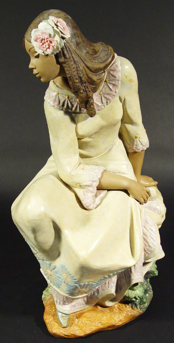 Appraisal: Large Lladro porcelain gris figurine with flowers in her hair