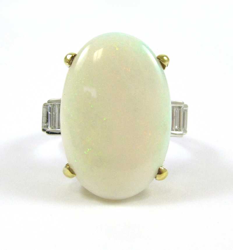 Appraisal: OPAL DIAMOND AND FOURTEEN KARAT GOLD RING The white and