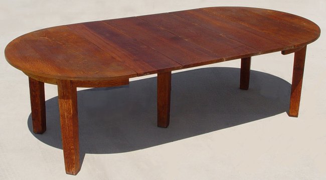 Appraisal: GUSTAV STICKLEY EXTENSION TABLE WITH LEAVES Circular top over legs