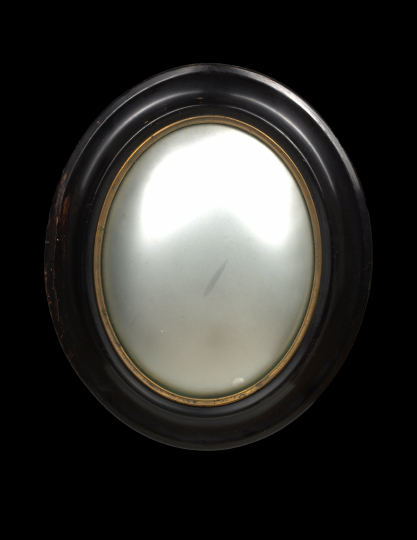 Appraisal: Continental Gilt-Brass-Mounted Black-Lacquer Oval Convex Looking Glass third quarter th