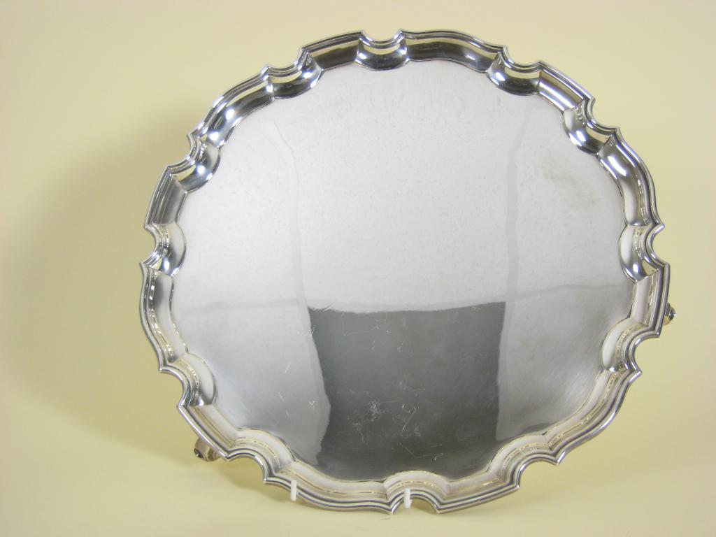 Appraisal: A George V circular Tray on three scroll feet Birmingham