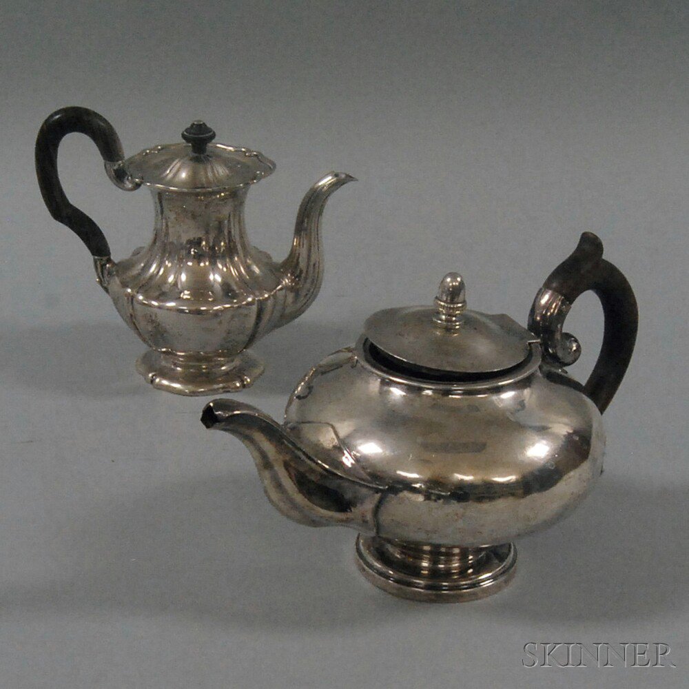 Appraisal: Two Continental Silver Teapots one squat round Belgian teapot with