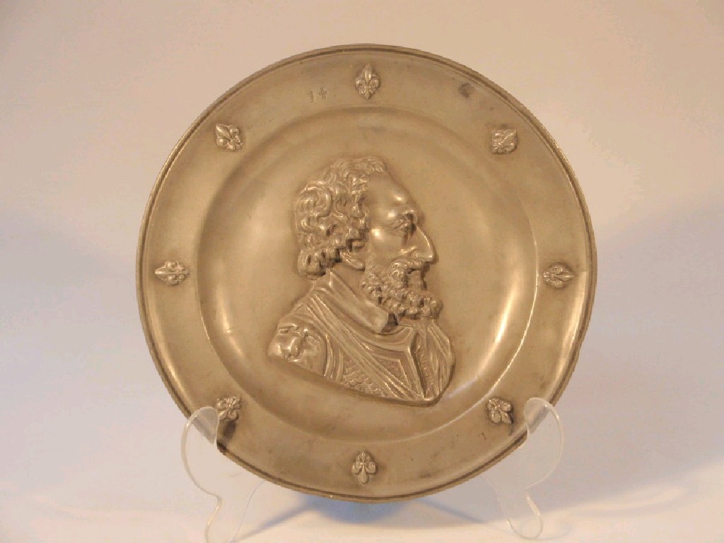 Appraisal: An thC French pewter plate with raised fleur-de-lys border and