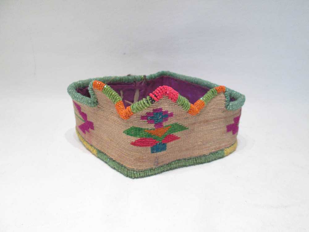 Appraisal: NATIVE AMERICAN PLATEAU CORN HUSK CROWN with colorful yarn geometric