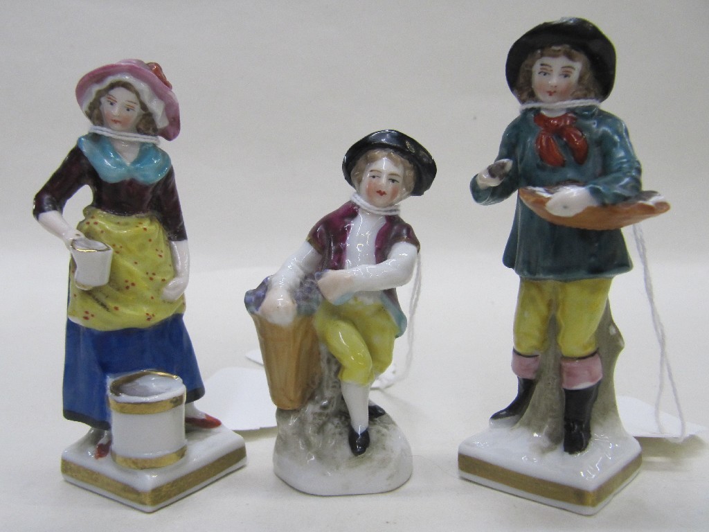 Appraisal: Three small continental figures of a flower seller fish seller