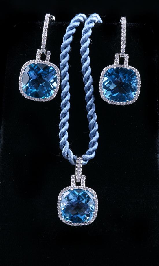 Appraisal: K WHITE GOLD BLUE TOPAZ AND DIAMOND PENDANT NECKLACE WITH