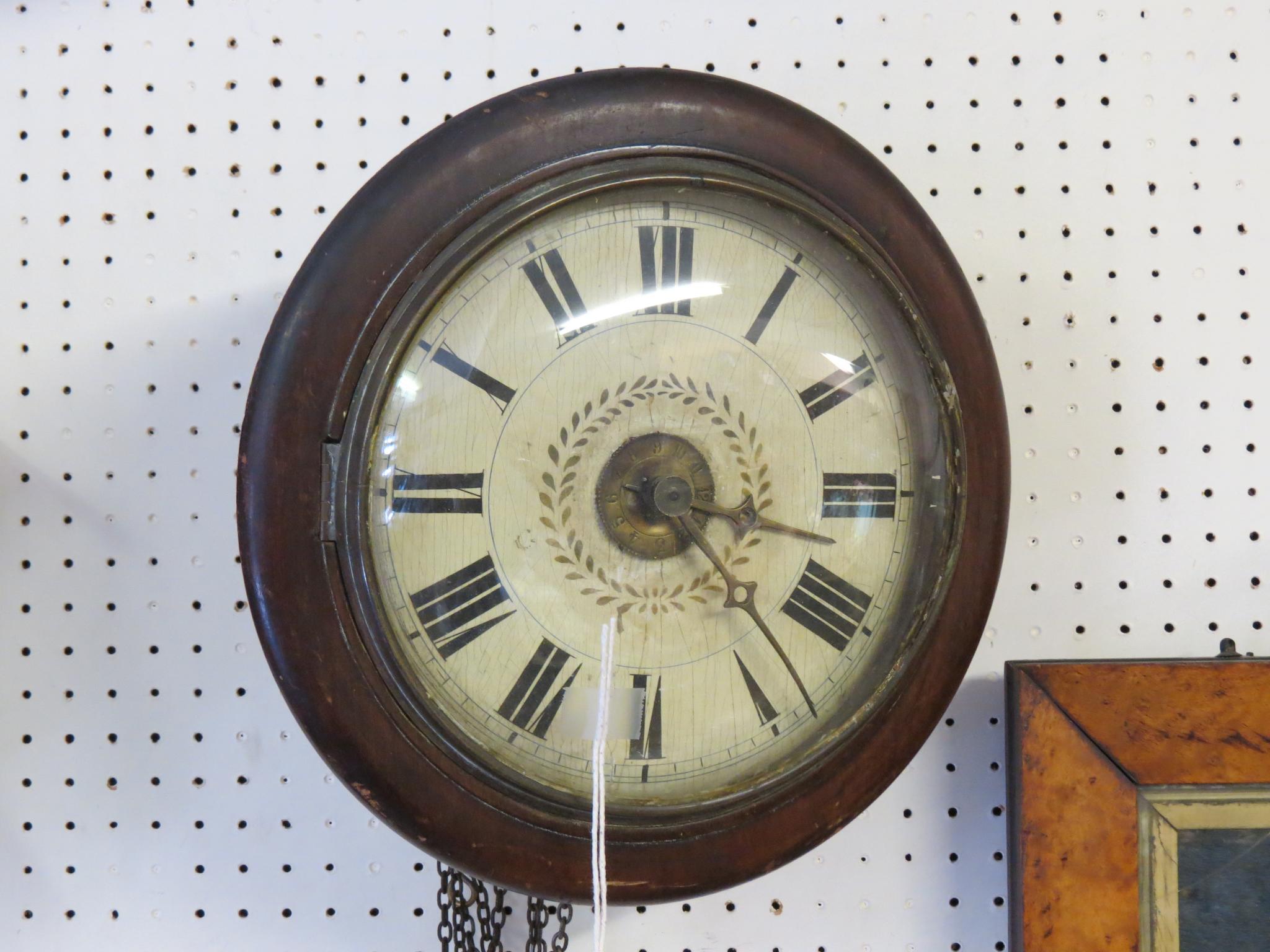 Appraisal: A Victorian dial clock convex enamelled dial with alarum post-framed