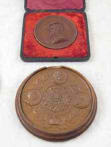 Appraisal: A bronze medallion celebrating Otto von Bismarck in turned and