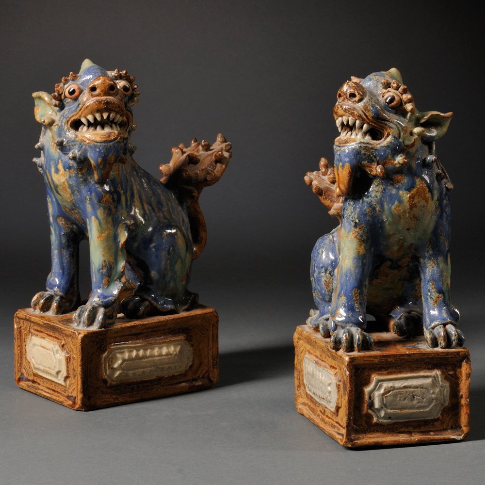 Appraisal: Pair of Ceramic Foo Lion China th century each seated