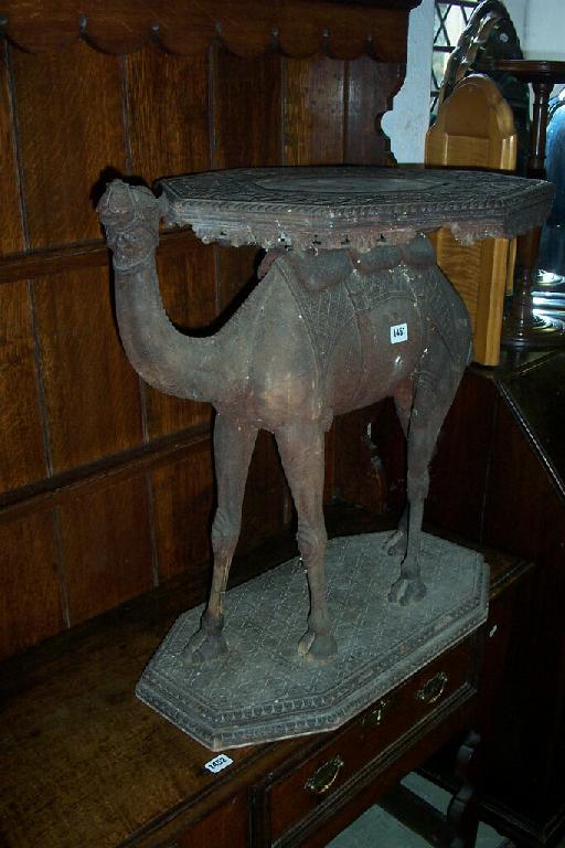 Appraisal: A th century carved hardwood camel table naturalistically carved the