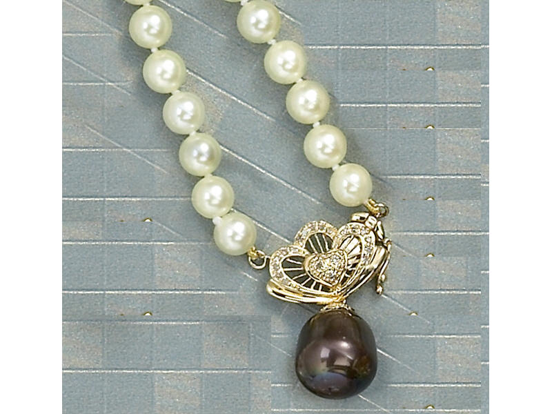 Appraisal: PEARL NECKLACE Cream color pearl necklace with pearls measuring mm