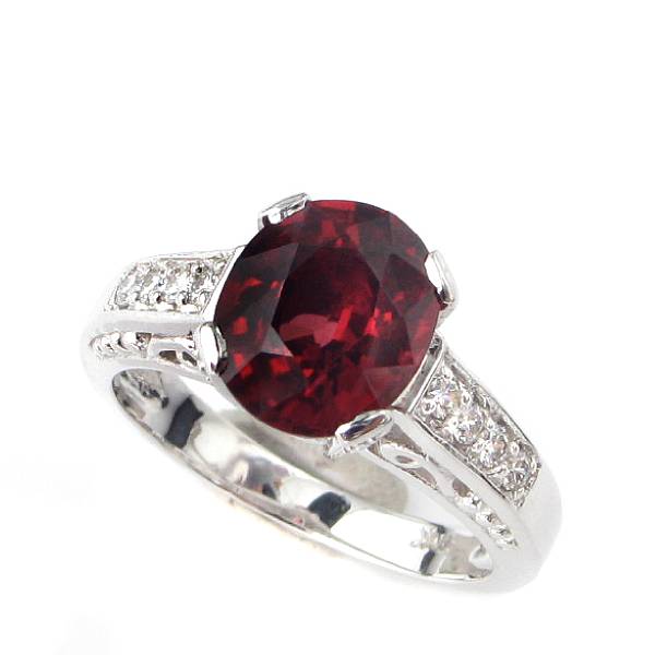 Appraisal: A reddish orange tourmaline diamond and k white gold ring