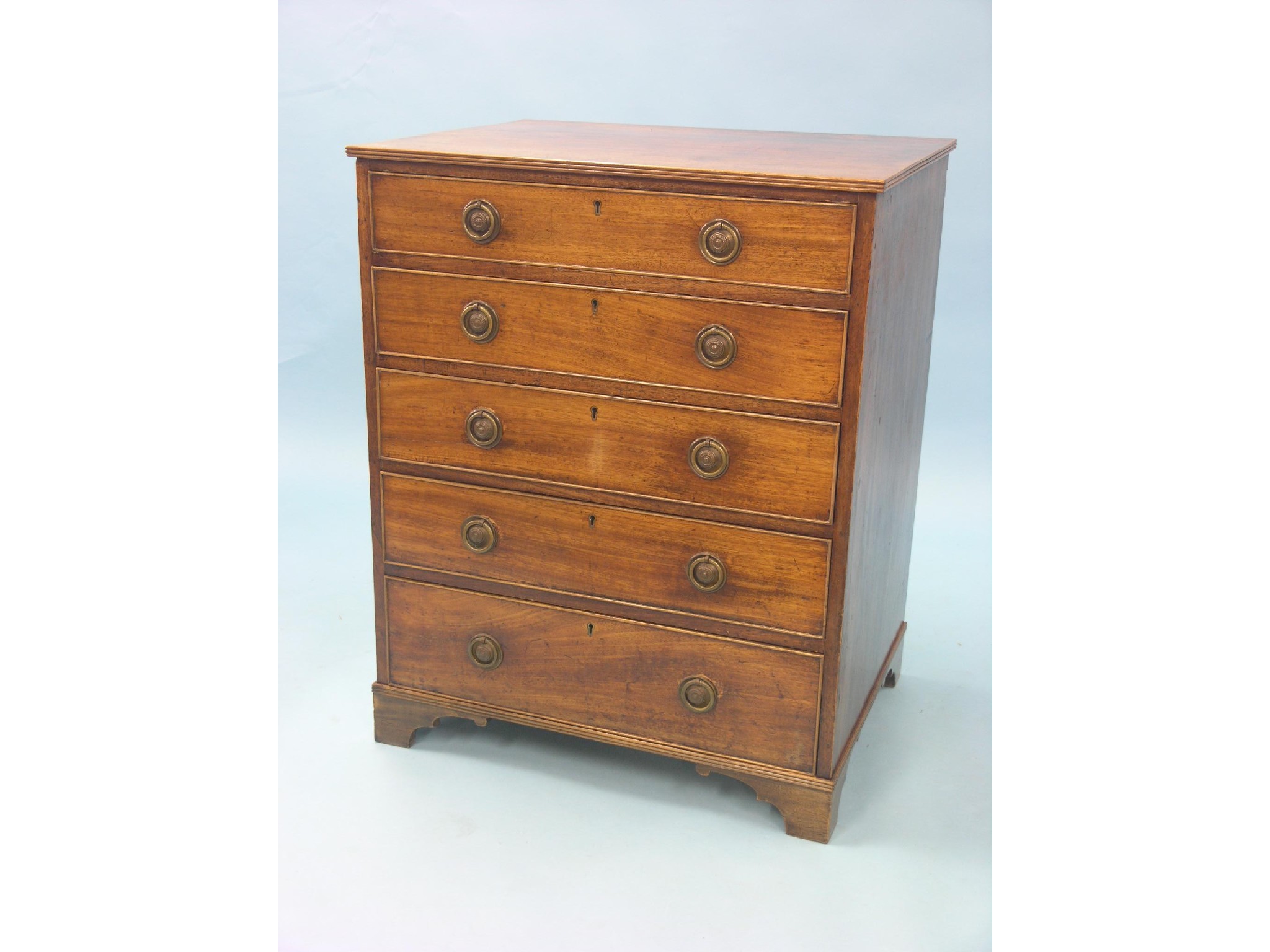 Appraisal: A late Victorian mahogany chest five long drawers each ash-lined