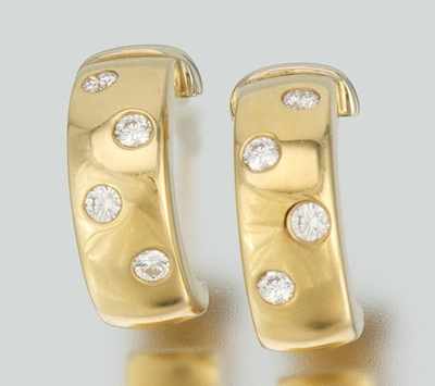 Appraisal: A Pair of Half Hoop Diamond Earrings k yellow gold