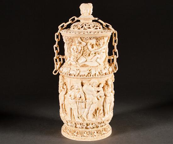 Appraisal: Indian elaborately carved ivory covered jar with detailed deity and