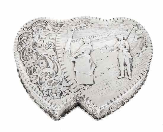 Appraisal: A Victorian silver double heart shaped box by William Comyns