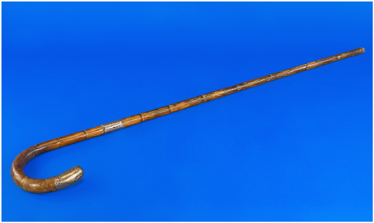 Appraisal: Bamboo Walking Cane With Silver Ferrule And Silver End Cap