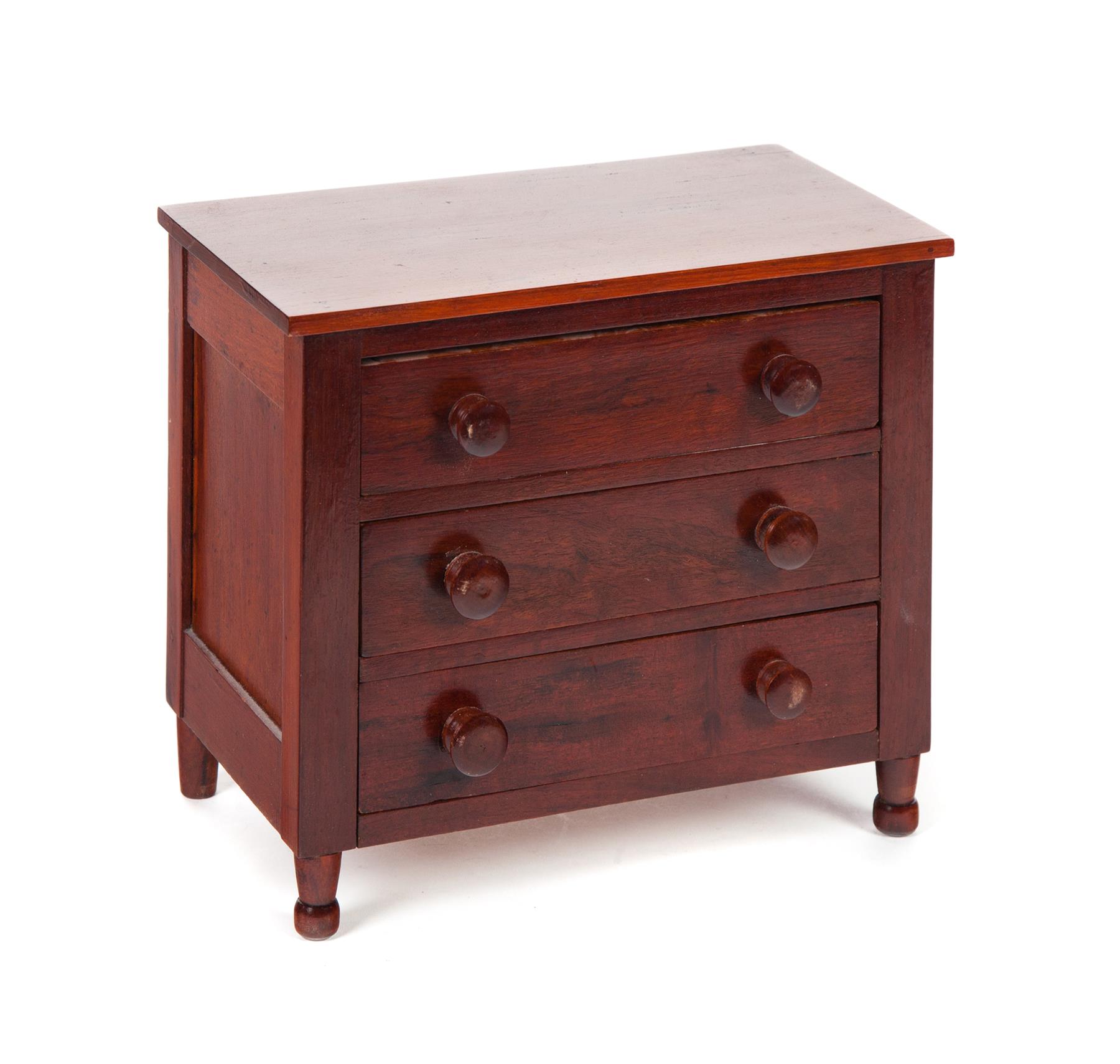 Appraisal: SHERATON-STYLE MINIATURE THREE-DRAWER CHEST American ca cherry Paneled ends and