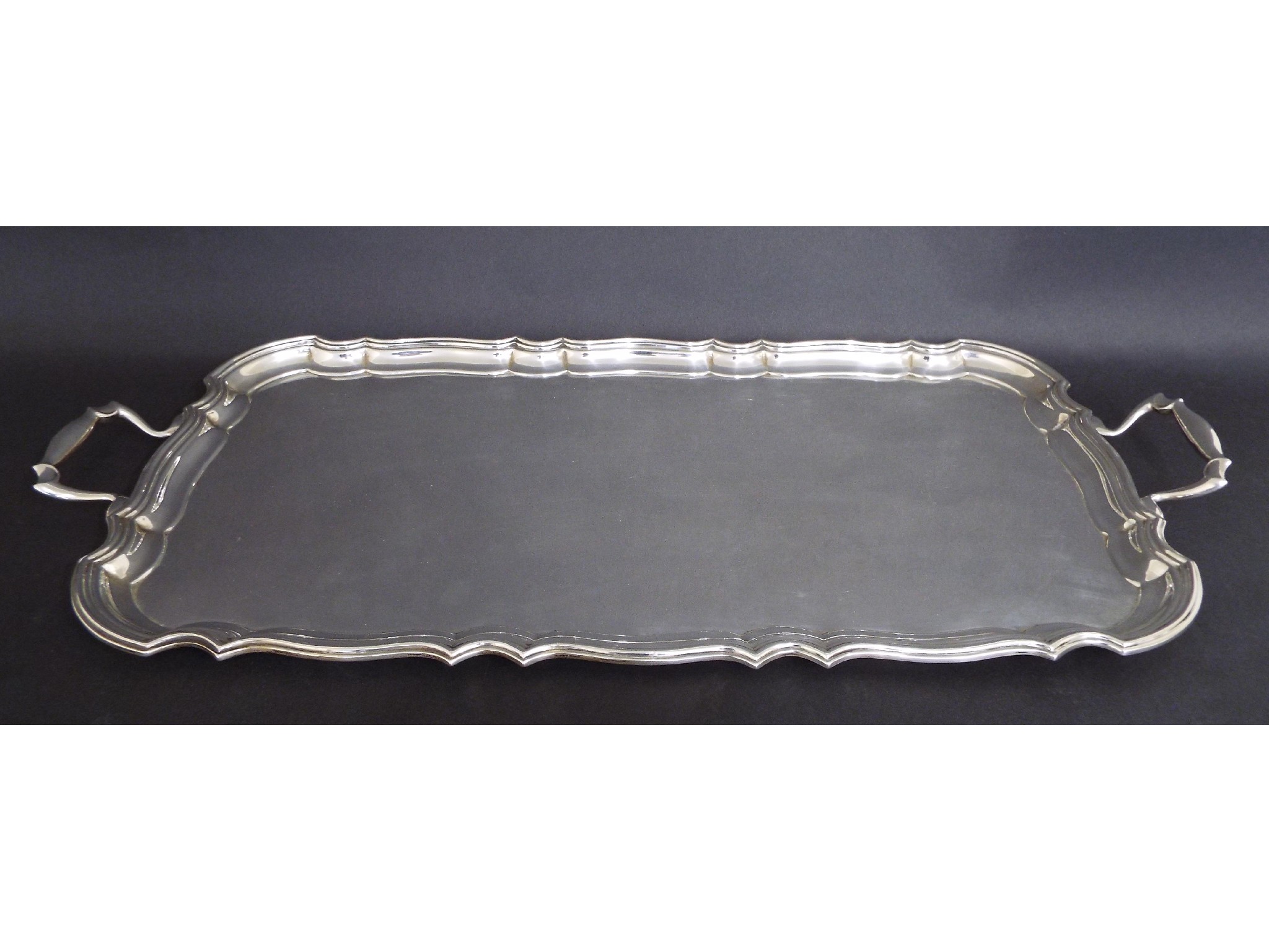 Appraisal: Good large s rectangular wavy rimmed twin handled tray upon